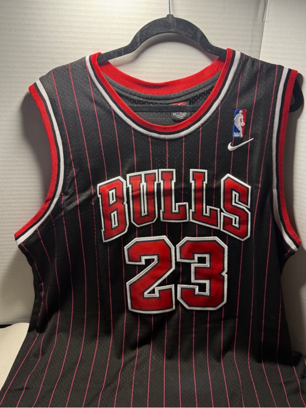 Jordan Nike Black Basketball Jersey with Pink Pinstripes - XL length +2